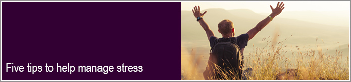 five tips to help manage stress. guy on hike with arms open to sky
